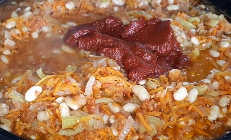 Add tomato paste to cook