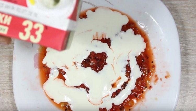 Add cream and condensed milk to the fruit puree.