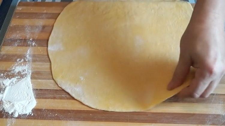 Roll out the dough to cook