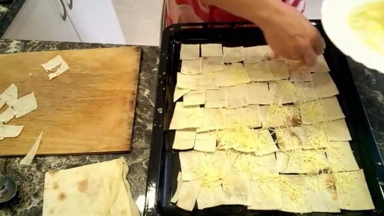 Grate cheese to cook