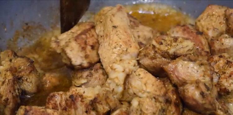 Shish kebab in a pan according to a step by step recipe with photo