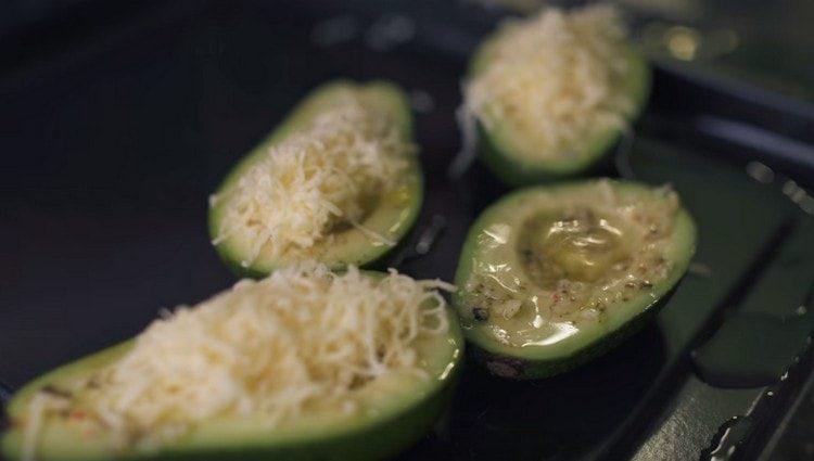 Put the grated cheese on top of the protein.