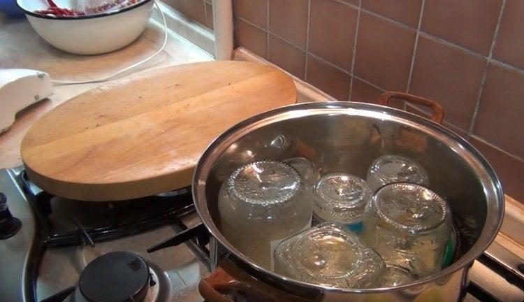 Adjika will be well kept if you roll it in sterilized jars.