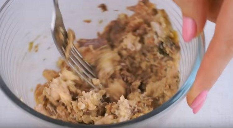 Knead the canned sardines with a fork.