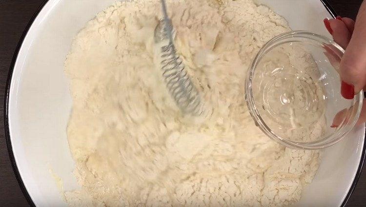 Add a little milk and vegetable oil to the dry ingredients,