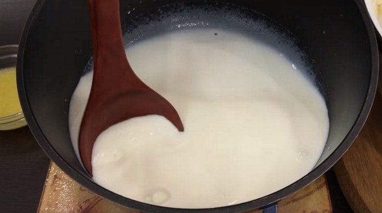 Bring the milk to a boil.