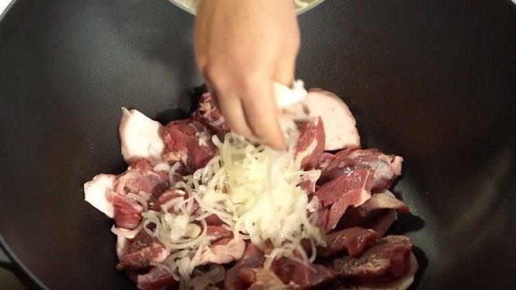 put the onion on top of the meat.