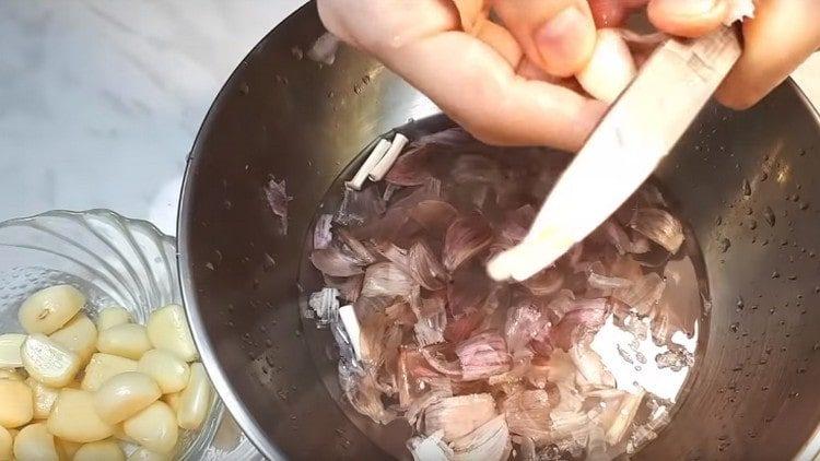 after water, garlic will easily peel.