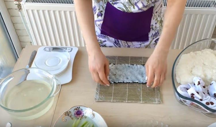 Put rice on a nori sheet.