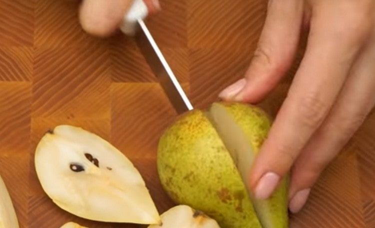 Pear cut into quarters.