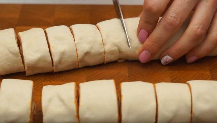Twist the dough into a roll and cut into small pieces