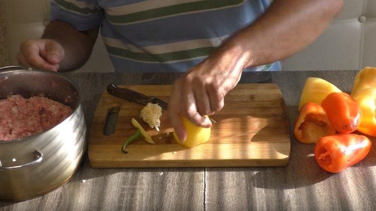 take out the veins and seeds from each peppercorn.