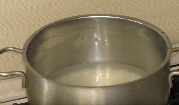 wash the rice, fill with water and set to cook.