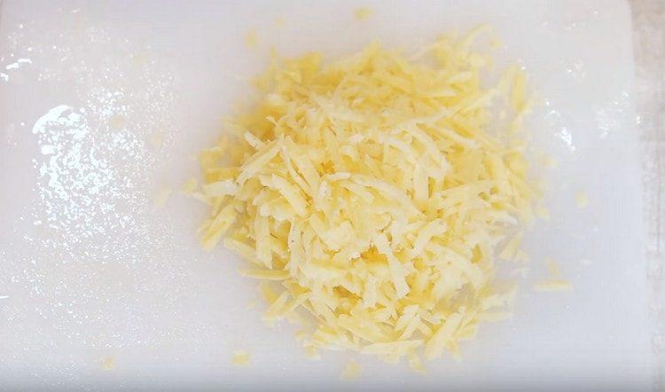 Grate the cheese.