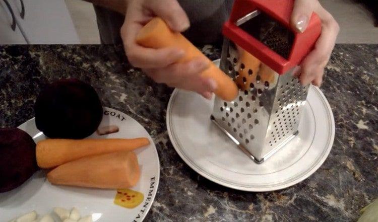 Grate carrots.
