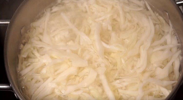 Boil cabbage in water.
