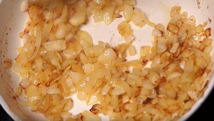 Grind onions and fry in butter until golden brown.