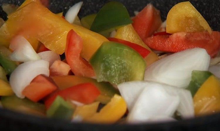 Add sweet pepper and onion to the pan.