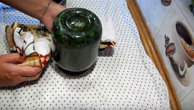 Turn the cans upside down.