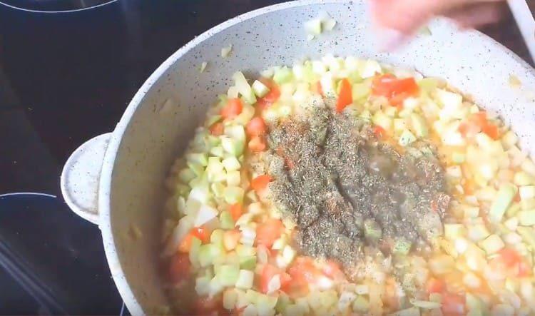 Salt, pepper the dish, add the basil.