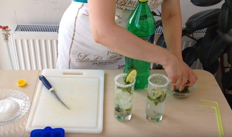 Garnish with mint and lime slices.