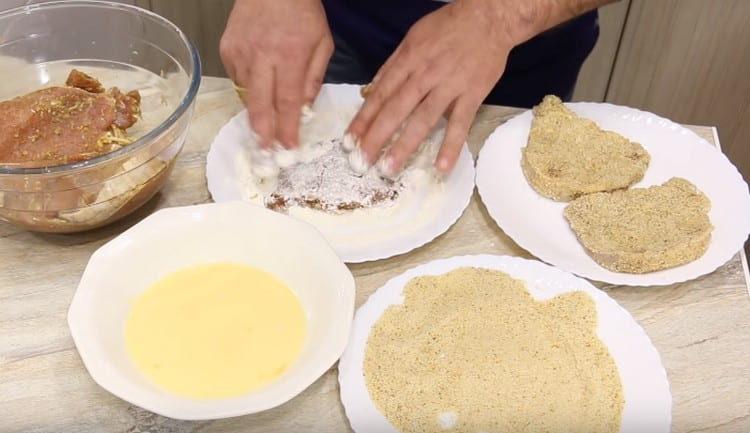 Roll each chop in flour.