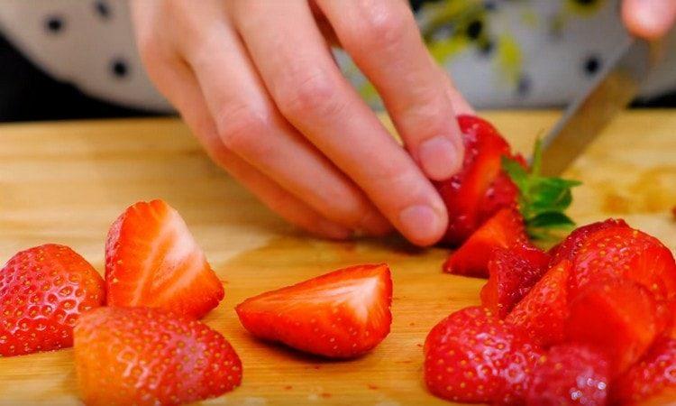 Finely chop the strawberries, and partly just cut in half.