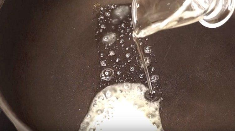 put a piece of butter in a pan, pour vegetable oil as well.