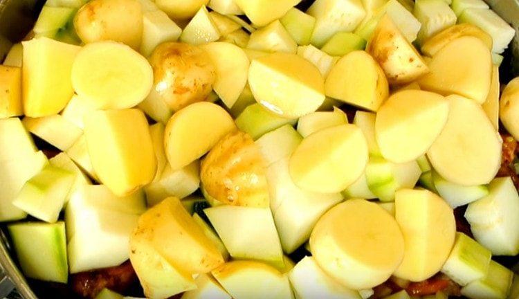 cut zucchini, potatoes and add to the pan.