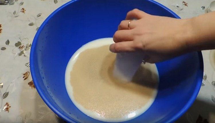 Add yeast and sugar.