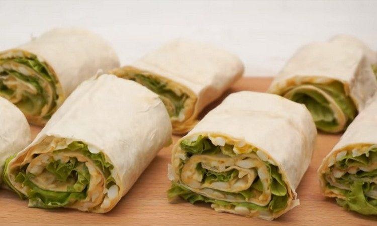 twist the pita bread into a roll and cut into portions.