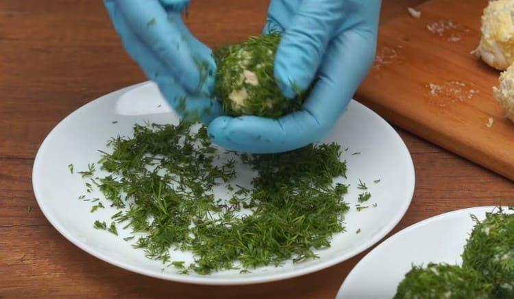 We roll part of the balls in chopped dill.