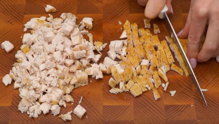 chop the baked chicken breast.