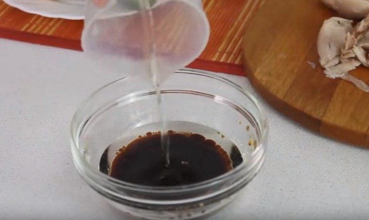 Cooking salad dressing.