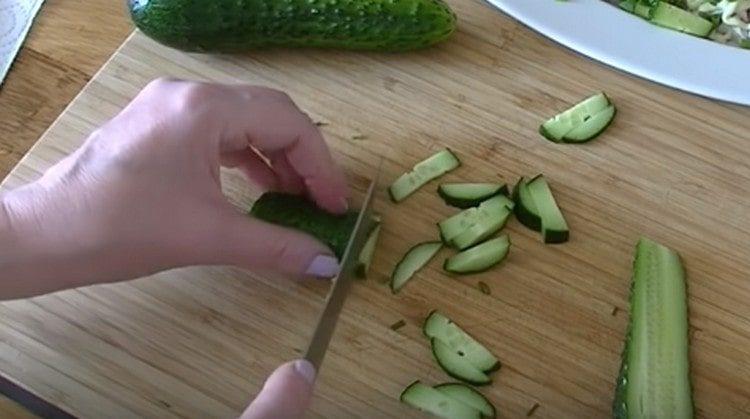 Tomatoes and cucumbers cut into strips.