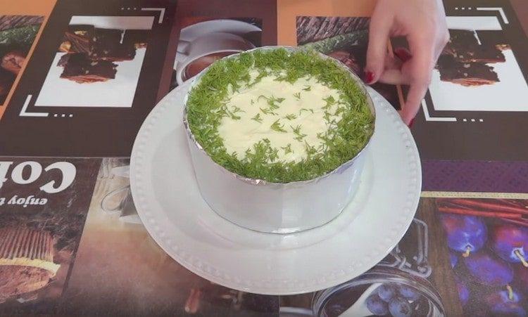 Sprinkle the salad with herbs around the perimeter.