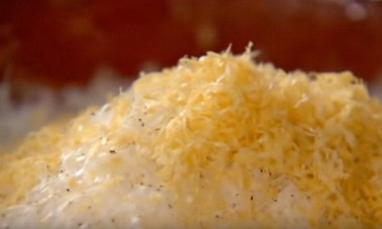 Rub parmesan, zest.