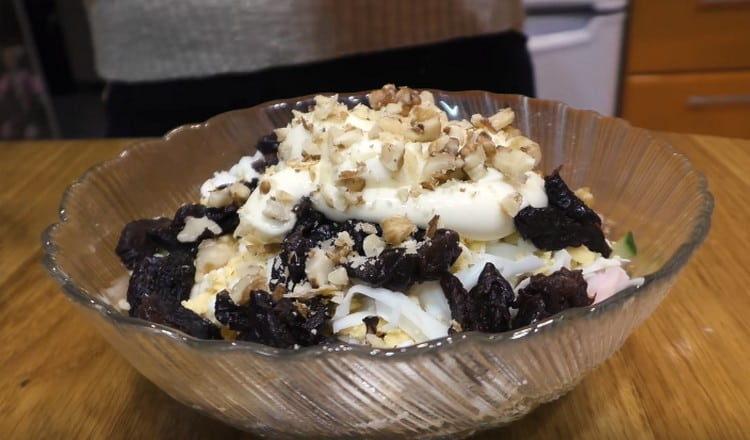 Add mayonnaise, nuts, and the prune salad is ready.