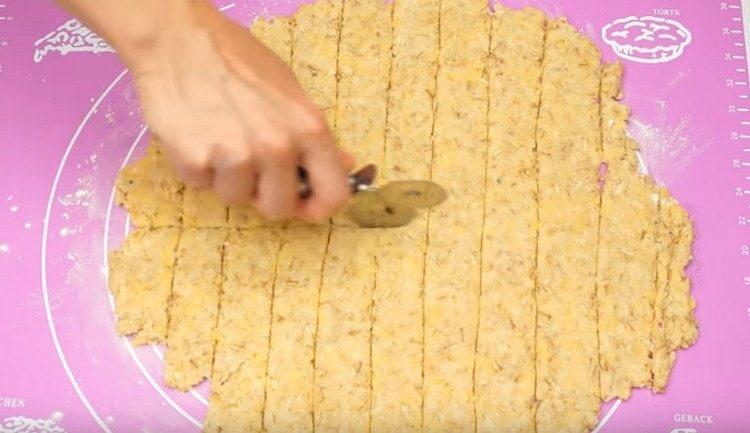 cut the dough into strips.
