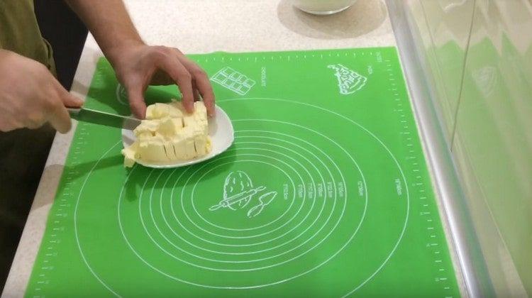 Cut the butter into pieces.