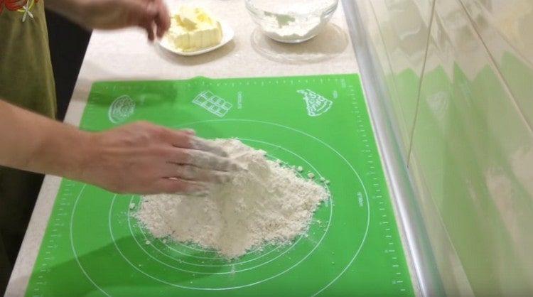 sift the flour onto the table.