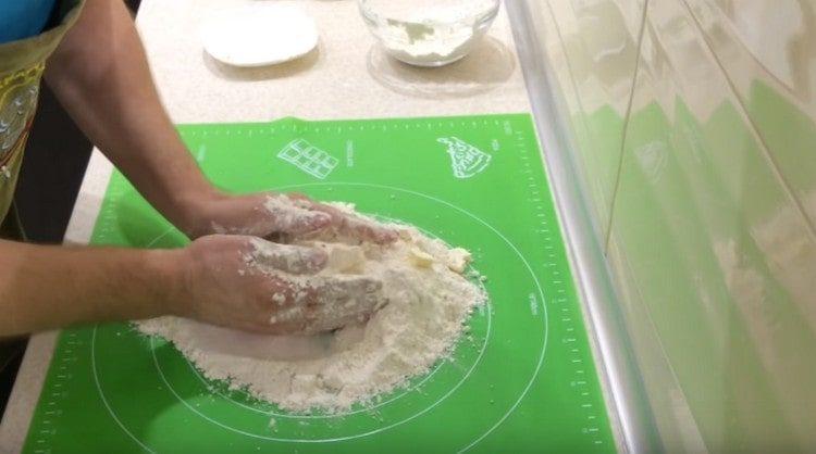 Add butter to flour.