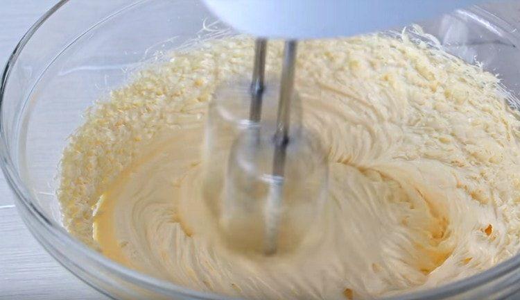 Beat soft butter with a mixer.