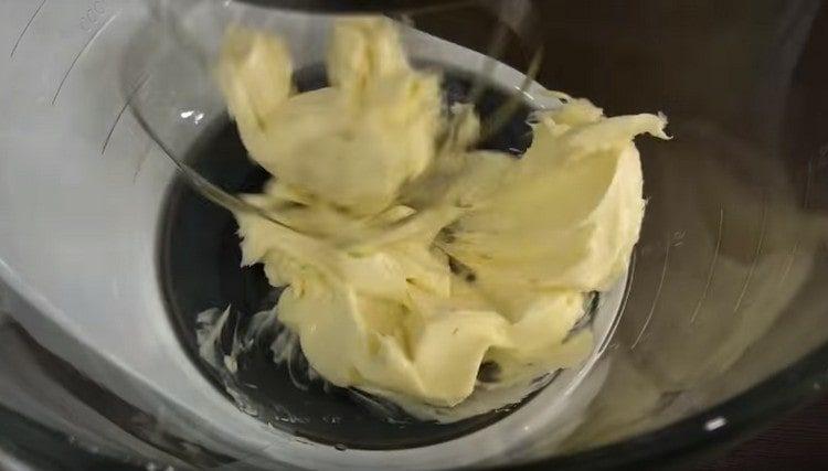 Beat soft butter with a mixer.