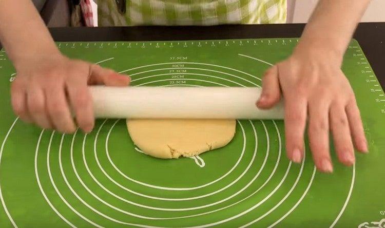 roll each piece of dough into a circle.