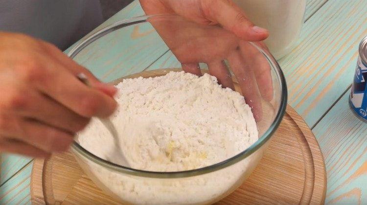 Add flour and knead the dough.