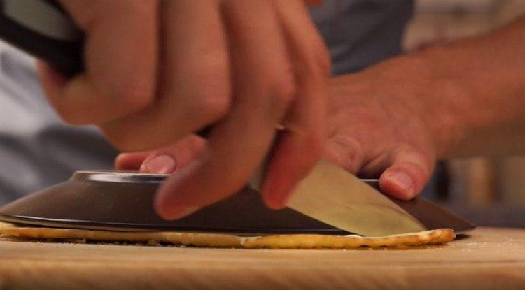 Trim the edges of the cakes using a plate as a pattern.