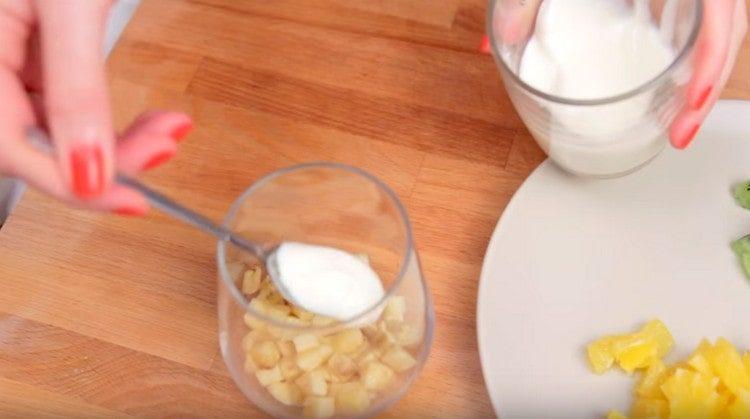 Grease bananas with natural yogurt.