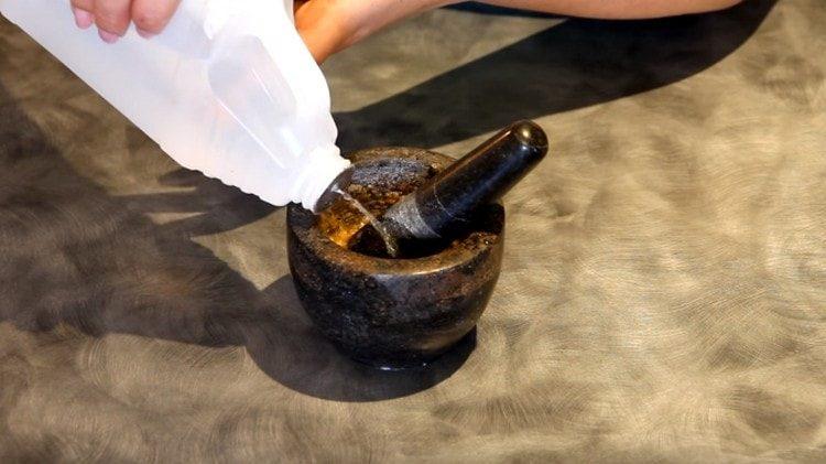 Add vinegar to the garlic dressing.