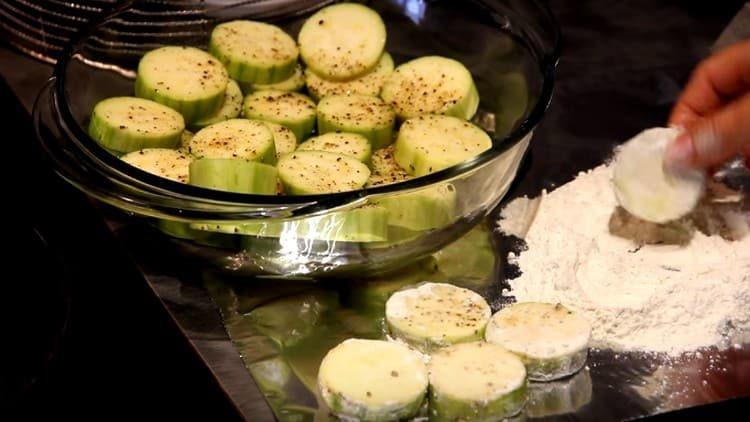 roll each zucchini in flour.